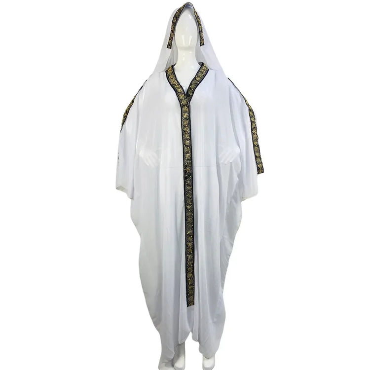Moroccan Hooded Abaya featuring a stylish design with wide batwing sleeves and a flowing maxi silhouette.