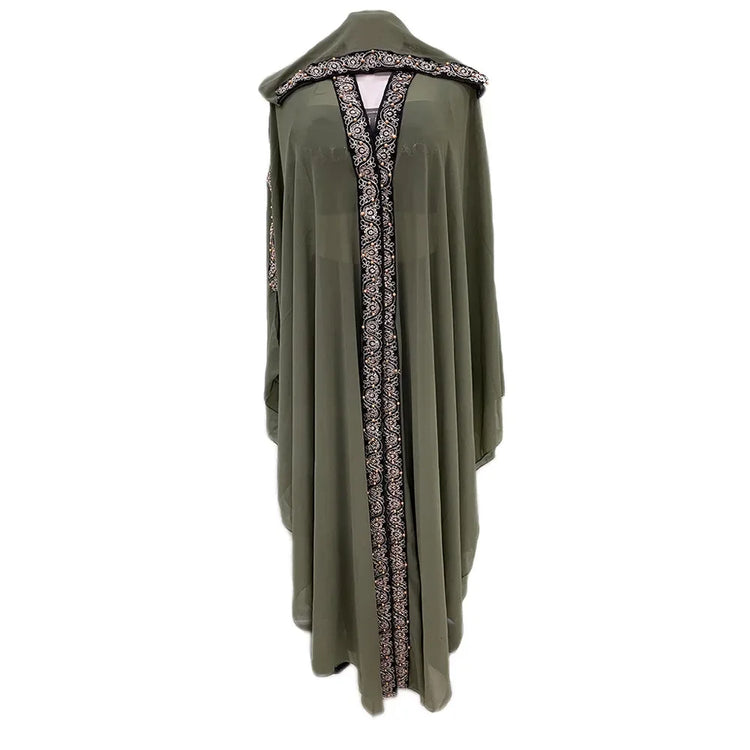 Moroccan Hooded Abaya featuring a stylish design with wide batwing sleeves and a flowing maxi silhouette.