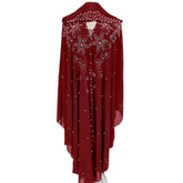 Moroccan Hooded Abaya featuring a stylish design with wide batwing sleeves and a flowing maxi silhouette.