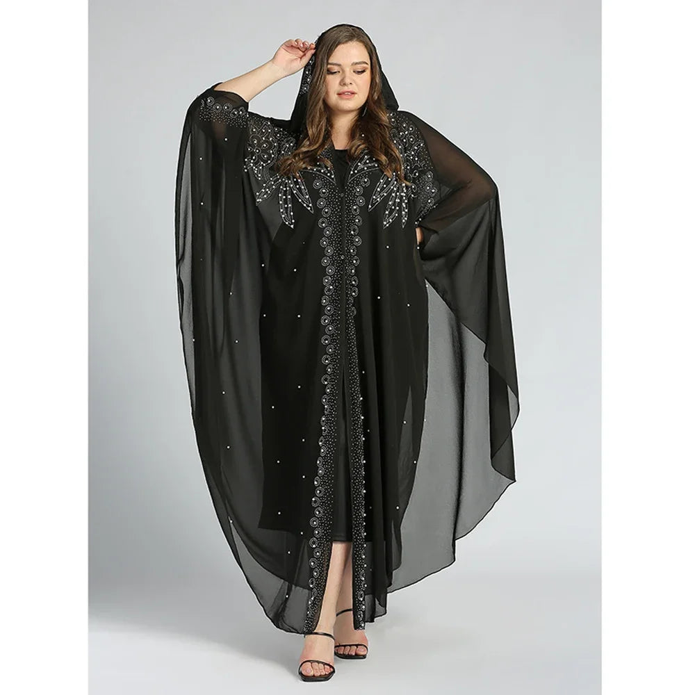Moroccan Hooded Abaya featuring a stylish design with wide batwing sleeves and a flowing maxi silhouette.