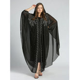 Moroccan Hooded Abaya featuring a stylish design with wide batwing sleeves and a flowing maxi silhouette.