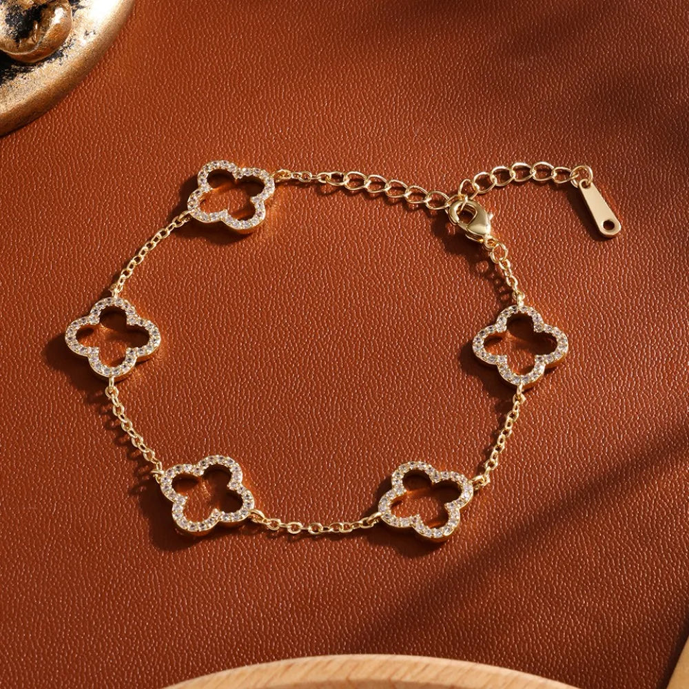 Elegant Female Stainless Steel Bracelet With Zircon Four-Leaf Clover Design Hollow Detail Fashion Accessory For Small Waist