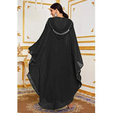 Moroccan Hooded Abaya featuring a stylish design with wide batwing sleeves and a flowing maxi silhouette.